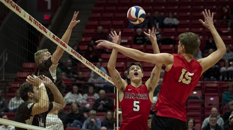 Junior setter Quinn Isaacson sets a ball for a teammate March 2, 2019, in a match against Quincy in John E. Worthen Arena. The Cardinals won the match in a 3-0 sweep. Ball State Athletics, Photo Provided