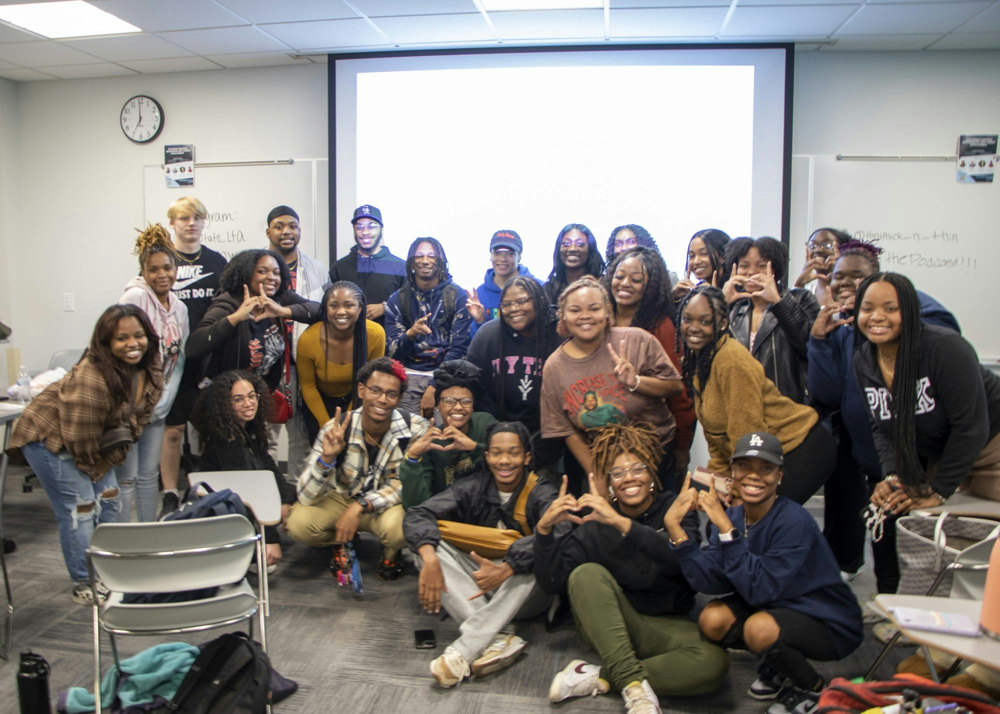  Audience members and organizers come together for a group picture in the Whitinger Business Building Nov. 9. This concluded the evening of discussion. Jayda Mann, DN