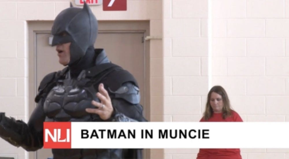 Batman travels to local schools