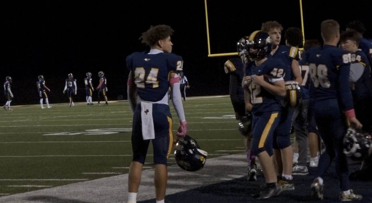 #24 Aven Thomas standing on the sideline 

Michael Baugh, NewsLink Indiana