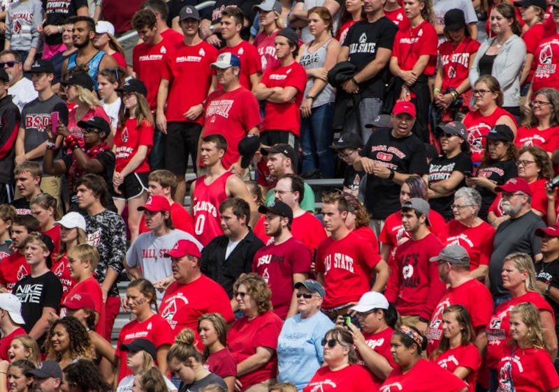 Audience members of all ages cheer on the Ball State Cardinals during the home opener&nbsp;game against Eastern Kentucky on Sept. 17 in Scheumann Stadium for Family Weekend. Ball State won 41-14. Grace Ramey // DN File