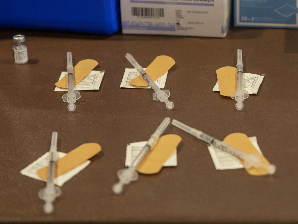 Prepared doses of the Pfizer COVID-19 vaccine sit on a table April 7, 2021, at IU Health Ball Memorial Hospital. Jaden Whiteman, DN File