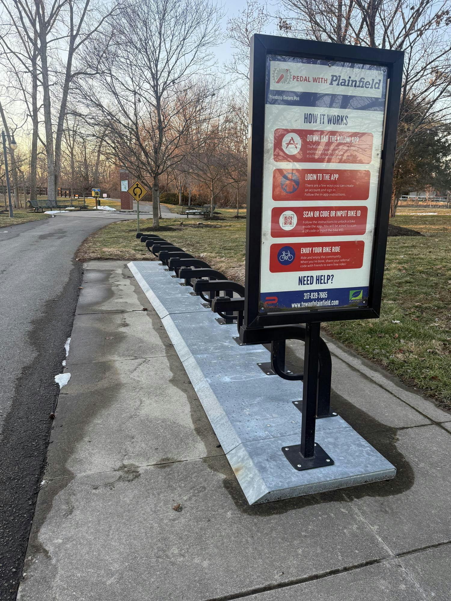 A bike rack in Plainfield, Indiana, for the Pedal with Plainfield initiative resides at Hummel Park. Pacers Bikeshare has been a catalyst to smaller bikeshare initiatives such as Pedal with Plainfield, which started in 2019 — five years after Pacers Bikeshare began. Photo by Kyle Stout