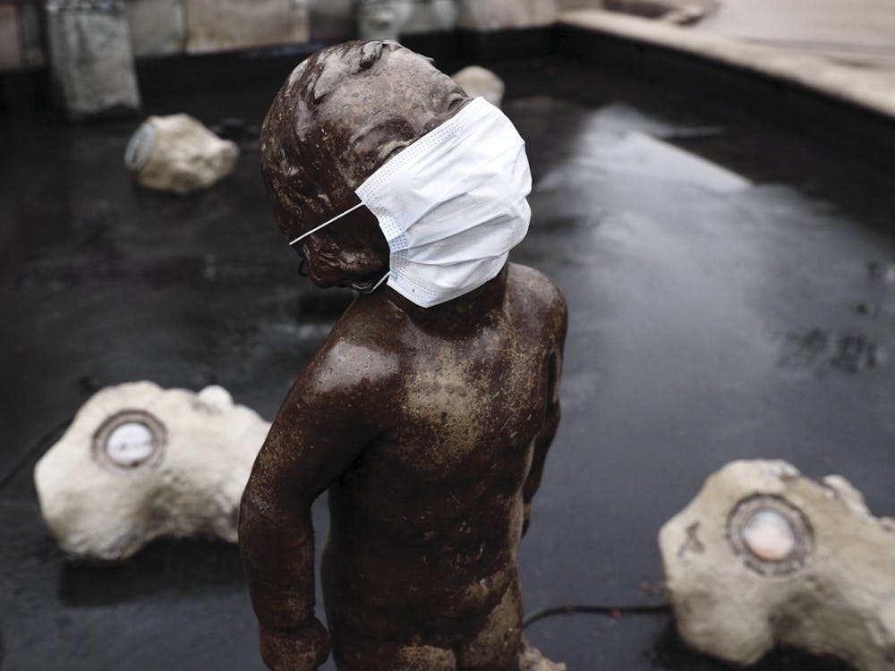 Frog Baby stands without water in a facemask March 16, 2020. March 16 was the first day of fully-online classes in the spring 2020 semester due to the coronavirus pandemic. Jacob Musselman, DN File