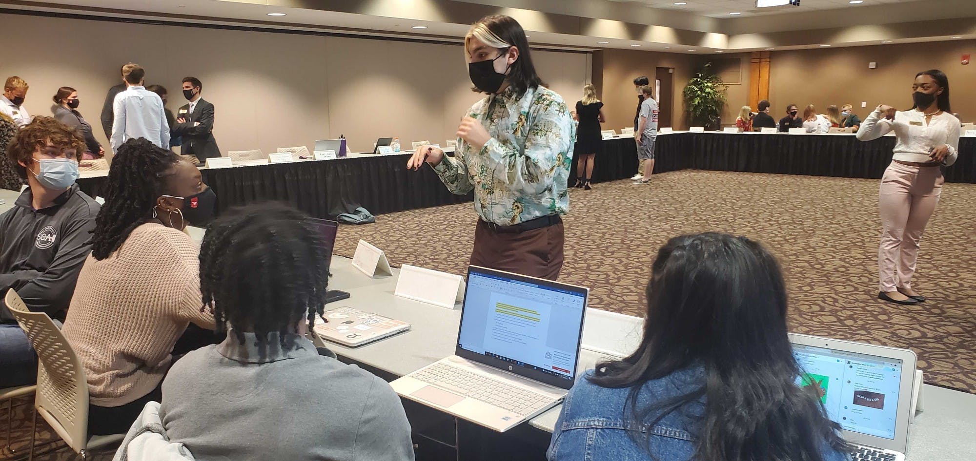 SGA Treasurer Jacob Bartolotta discusses an upcoming financial meeting regarding the first budget request of the semester with senators. Bartolotta teased this SGA funded project will be a community garden at the Oct. 6 meeting. Nathan Hill, DN