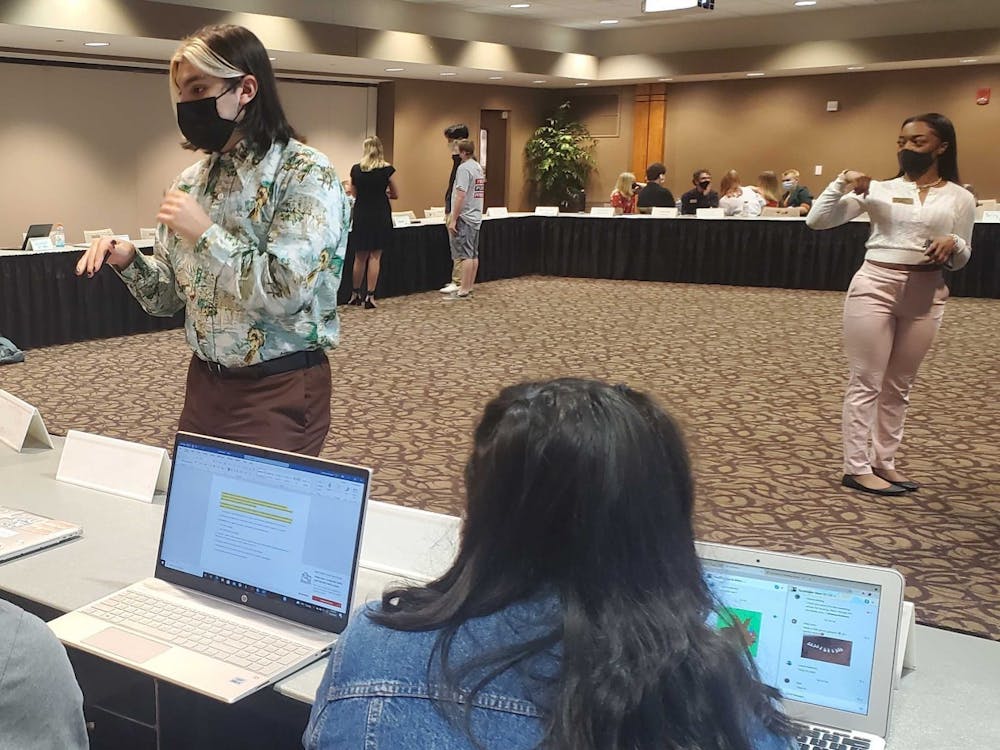 SGA Treasurer Jacob Bartolotta discusses an upcoming financial meeting regarding the first budget request of the semester with senators. Bartolotta teased this SGA funded project will be a community garden at the Oct. 6 meeting. Nathan Hill, DN