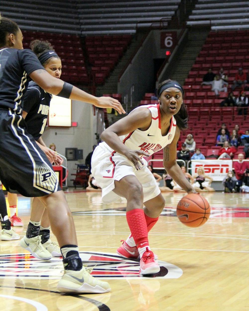 Guard Frannie Frazier drives the ball in during the Cardinals’ game against Purdue on Dec. 8 in Worthen Arena. Paige Grider, DN File