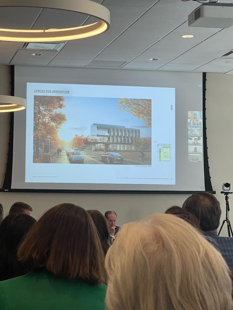 Limestone, glass and metal are the materials used in the design for the new Center of Innovation. This building will be built near the Village. Ellie Marker, DN photo.