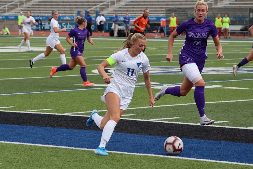 Marcy Barberic driving towards the Niagara goal. 