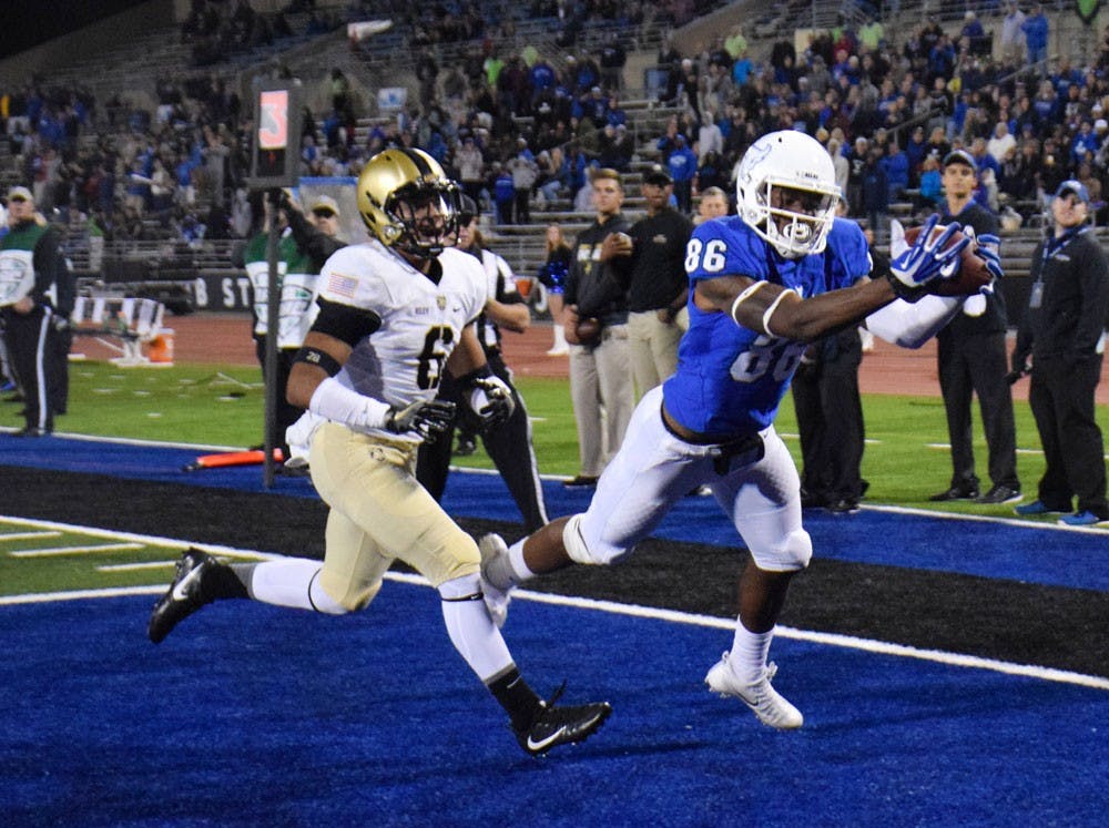 <p>Rising senior receiver Kamathi Hosley plays in a game last year. The Bulls will need their wide receivers to step up this season.</p>