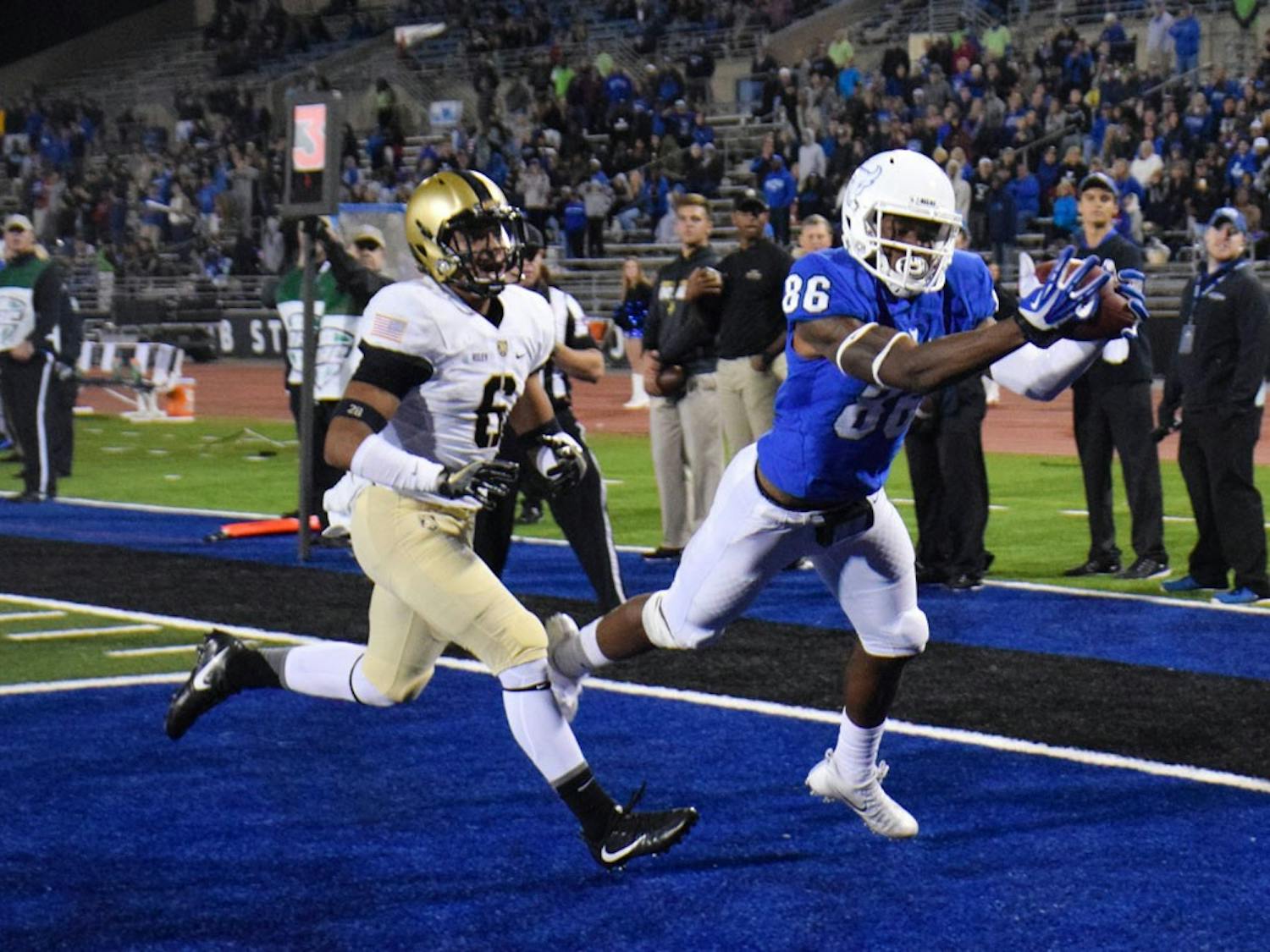 Rising senior receiver Kamathi Hosley plays in a game last year. The Bulls will need their wide receivers to step up this season.