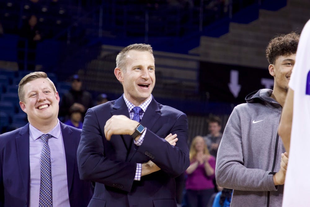 Nate Oats looks on at senior day. Oats' new contract will run through 2024 with an annual salary of $837,000.
