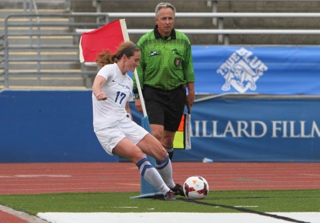 Senior defender Sophie Therien takes a corner kick. The team will travel to
Mount Pleasant, MIchigan to take on Central Michigan this Friday.&nbsp;Chad Cooper, The Spectrum&nbsp;