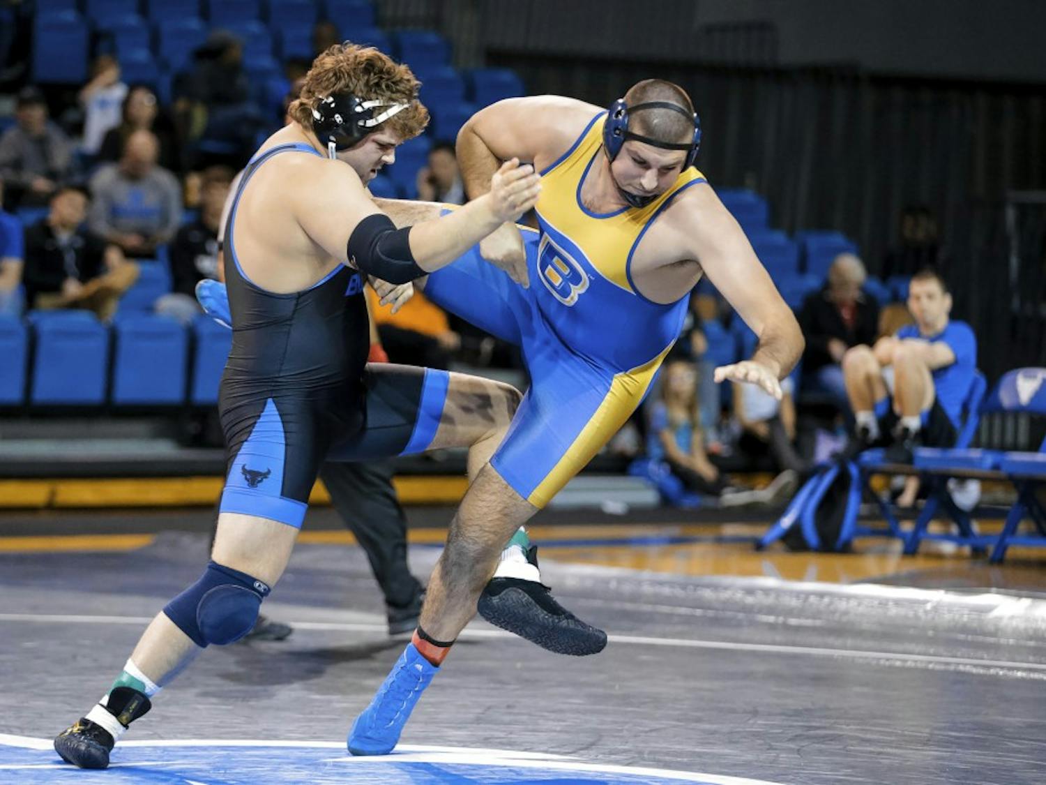 Redshirt junior Jake Gunning takes down an opponent. Gunning is the reigning MAC champion in the heavyweight division.