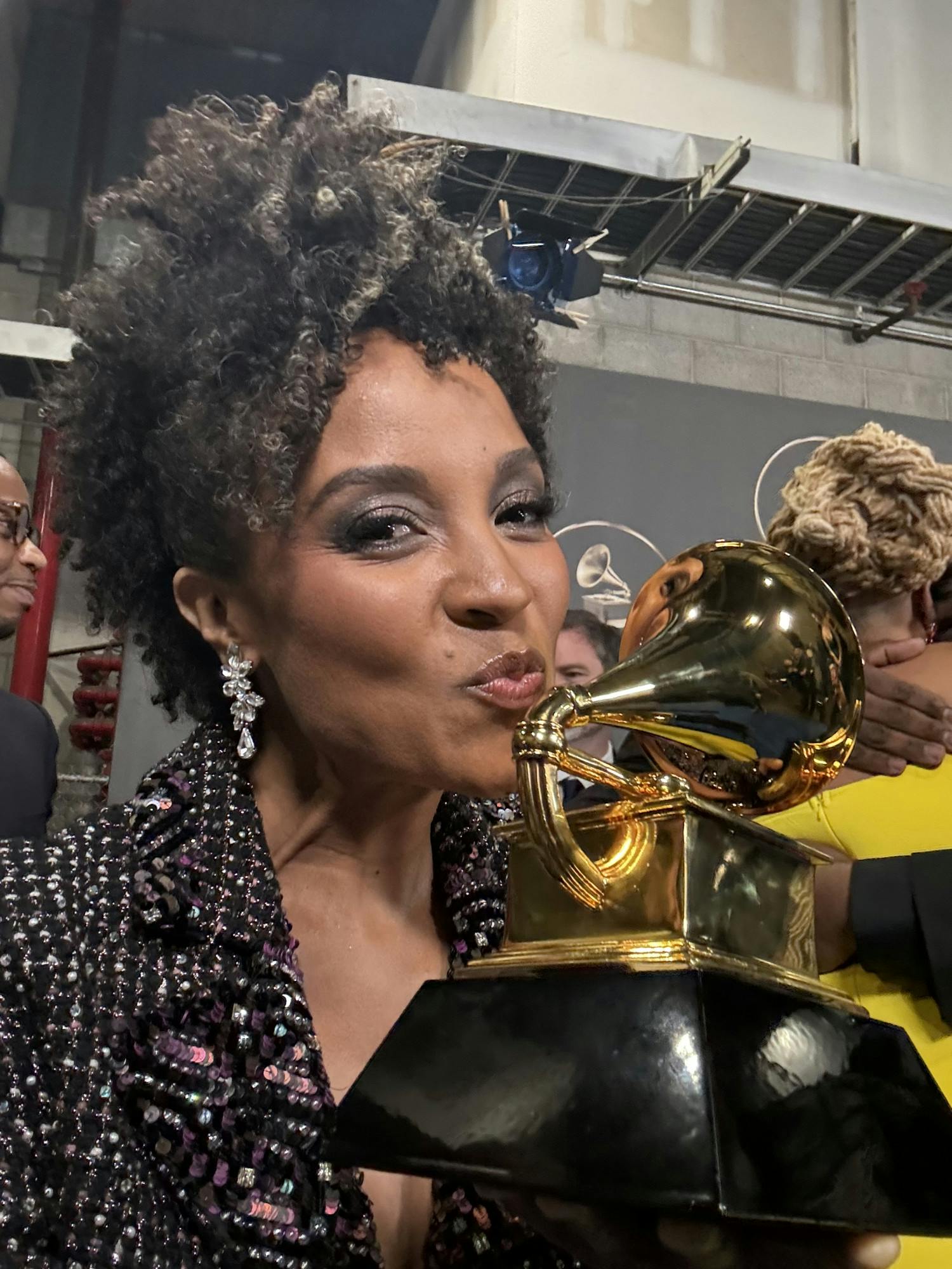 UB professor Melissa White holds up her Grammy award shortly after the ceremony. Courtesy of Melissa White