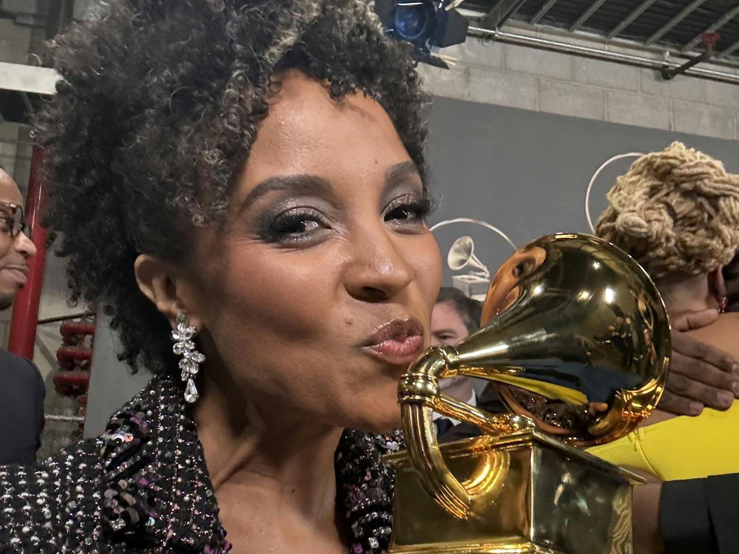 UB professor Melissa White holds up her Grammy award shortly after the ceremony. Courtesy of Melissa White