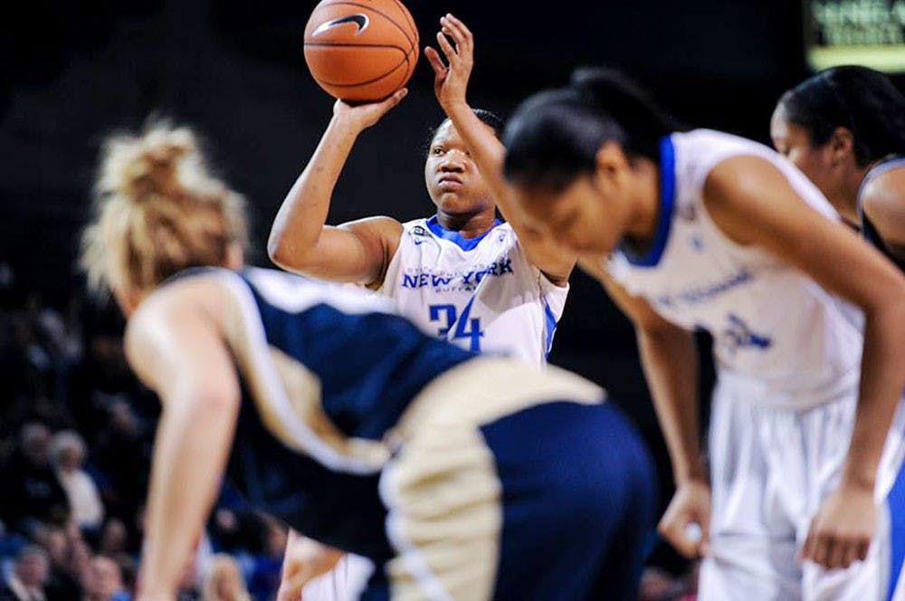 <p>Sophomore Alexus Malone prepares to shoot a free throw. Malone averaged 10.5 points and 7.7 rebounds in 32 games for the Bulls last season.</p>