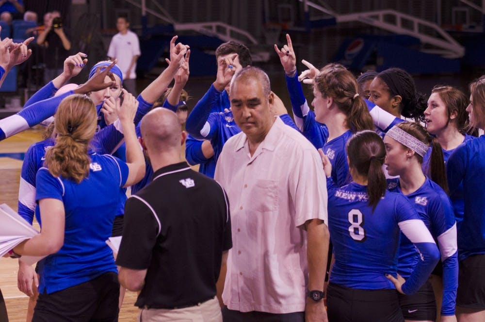 <p>Reed Sunahara walks out of the Buffalo huddle at a Bulls volleyball game in Alumni Arena during the 2014 season. Sunahara resigned his position as head coach on Monday to take the same job at West Virginia. </p>