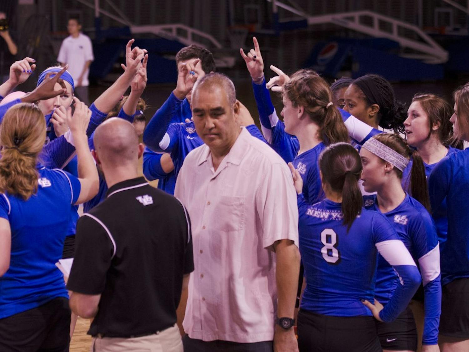 Reed Sunahara walks out of the Buffalo huddle at a Bulls volleyball game in Alumni Arena during the 2014 season. Sunahara resigned his position as head coach on Monday to take the same job at West Virginia.