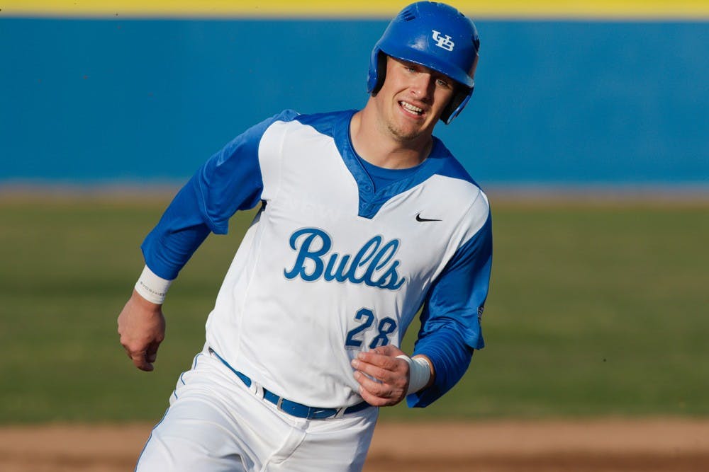 <p>Senior Vinny Mallaro rounds the bases. UB baseball played in a three-game series against the Kent State Golden Flashes over the weekend.</p>