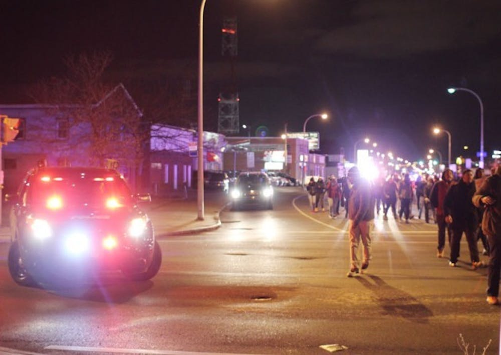 On Tuesday night, Buffalo State College students held a peaceful protest in response the non-indictment of Officer Darren Wilson. Protestors, including students from UB and Buffalo State, marched down Elmwood Avenue and ended the protest with a candlelight vigil. &nbsp;
Charles W Schaab, The Spectrum