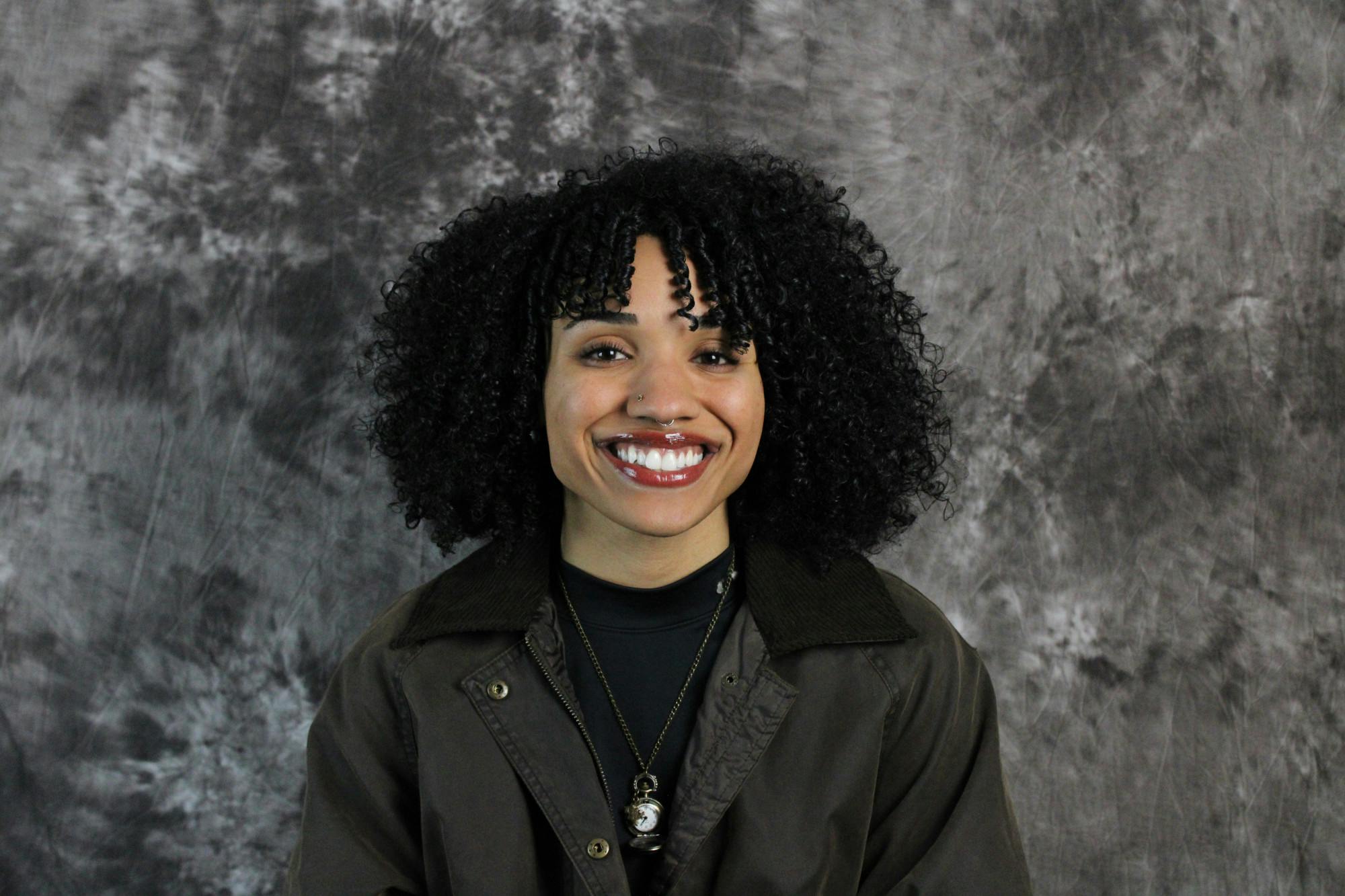 Headshot of Mia Malcoln.