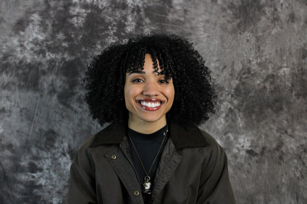 Headshot of Mia Malcoln.