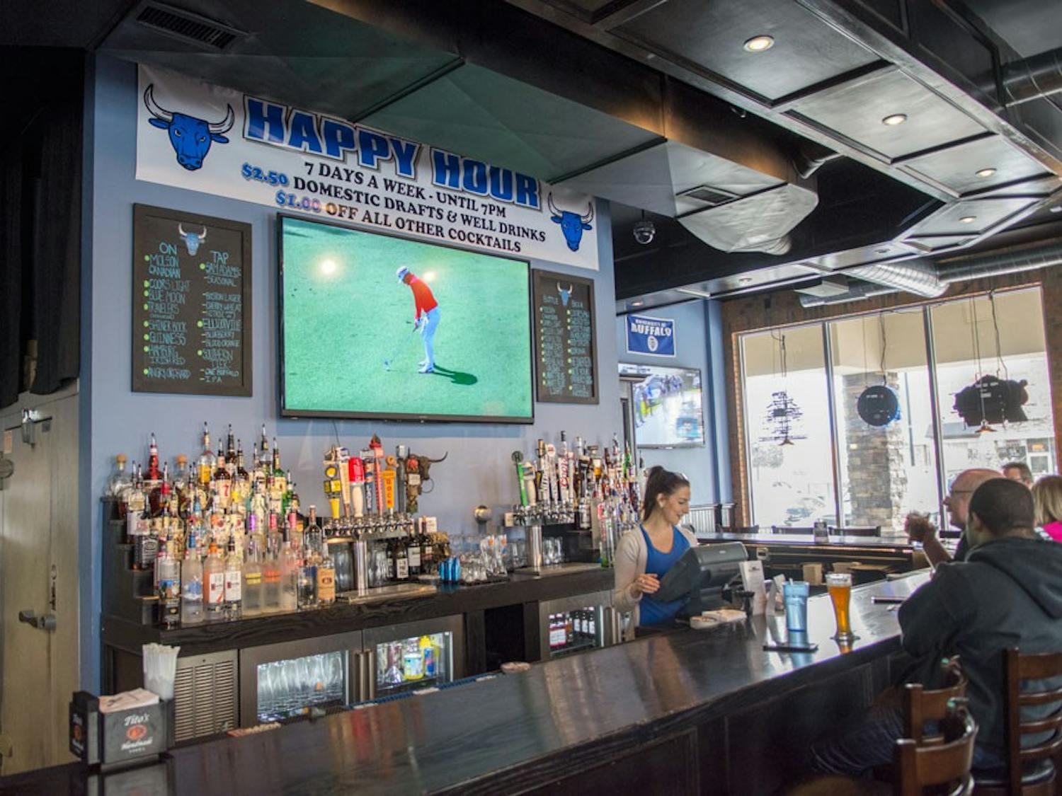 The Blue Bull Tavern, located at 1300 Sweet Home Road, brings a mixture of UB students, parents and children to the place that specializes in gourmet food and craft beer.&nbsp;