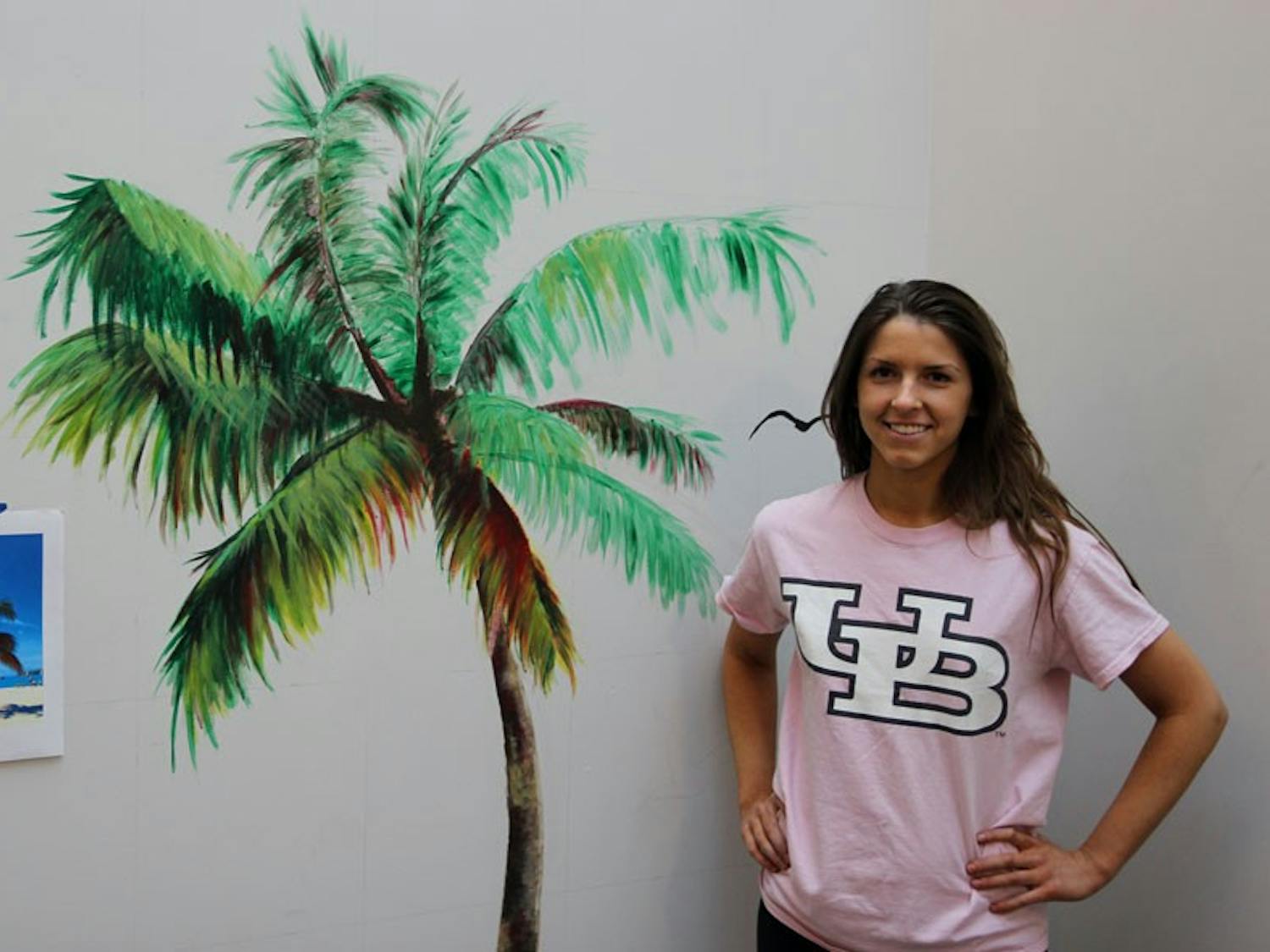 Paula Zych, a junior fine arts major and Buffalo native, wanted to bring a piece of tropical happiness Buffalo - her own mini-rebellion against Buffalo’s oppressive winter weather.