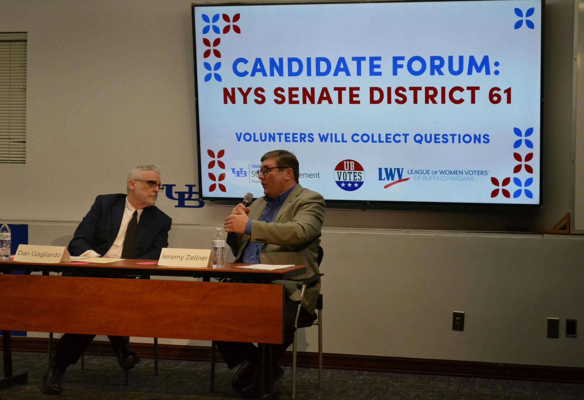 Republican candidate Dan Gagliardo (left) and Democratic candidate Jeremy Zellner (right) talk at the UB-hosted forum Thursday night in Student Union 330. 
