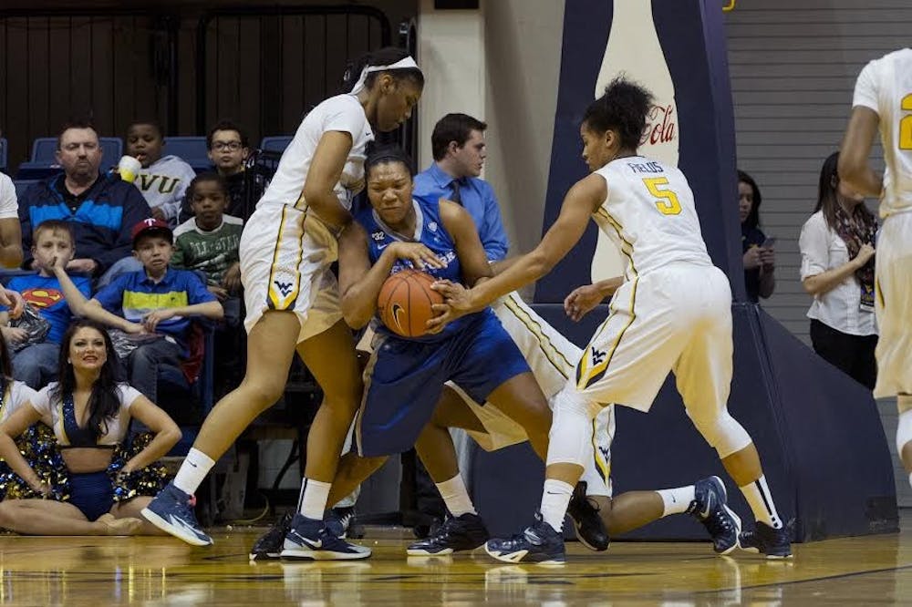 <p>Sophomore forward Alexus Malone fights for a rebound against West Virginia on Thursday in the first round of the WNIT. Buffalo fell 84-61 and its season is now over. </p>