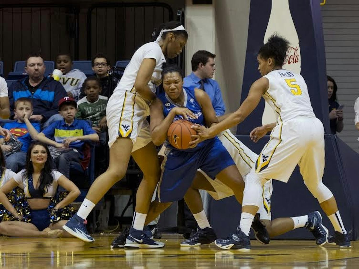 Sophomore forward Alexus Malone fights for a rebound against West Virginia on Thursday in the first round of the WNIT. Buffalo fell 84-61 and its season is now over.
