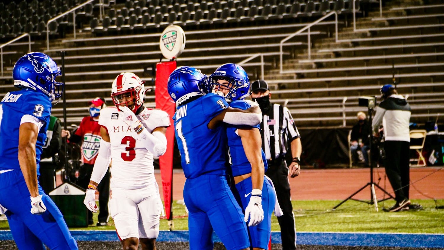 Senior wide receivers Antonio Nunn (1) and Jovany Ruiz (41) celebrate after a UB touchdown.