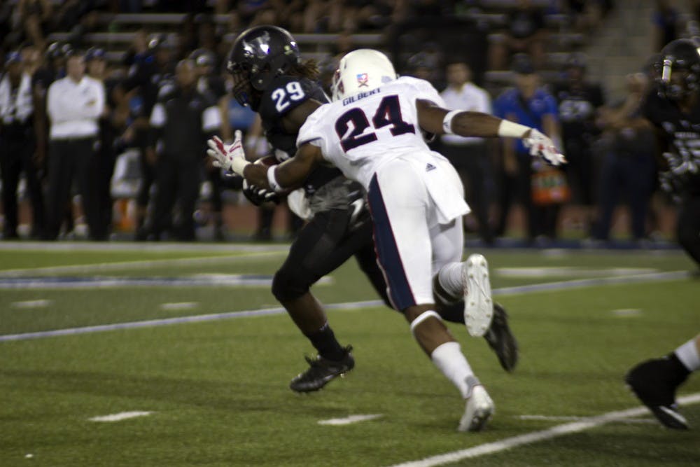 <p>Redshirt sophomore running back Emmanuel Reed running in last Saturday's blackout game. He is coming off back-to-back 100+ yard games.</p>