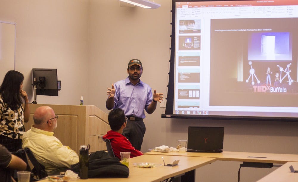 Alan Hunt, a department of computer science and engineering professor and president of Inve[n|s]t, speaks to club members at an Inve[n|s]t Thursday night meeting.&nbsp;The club began earlier this year and welcomes students, faculty and UB alums to combine business and computer science skills.