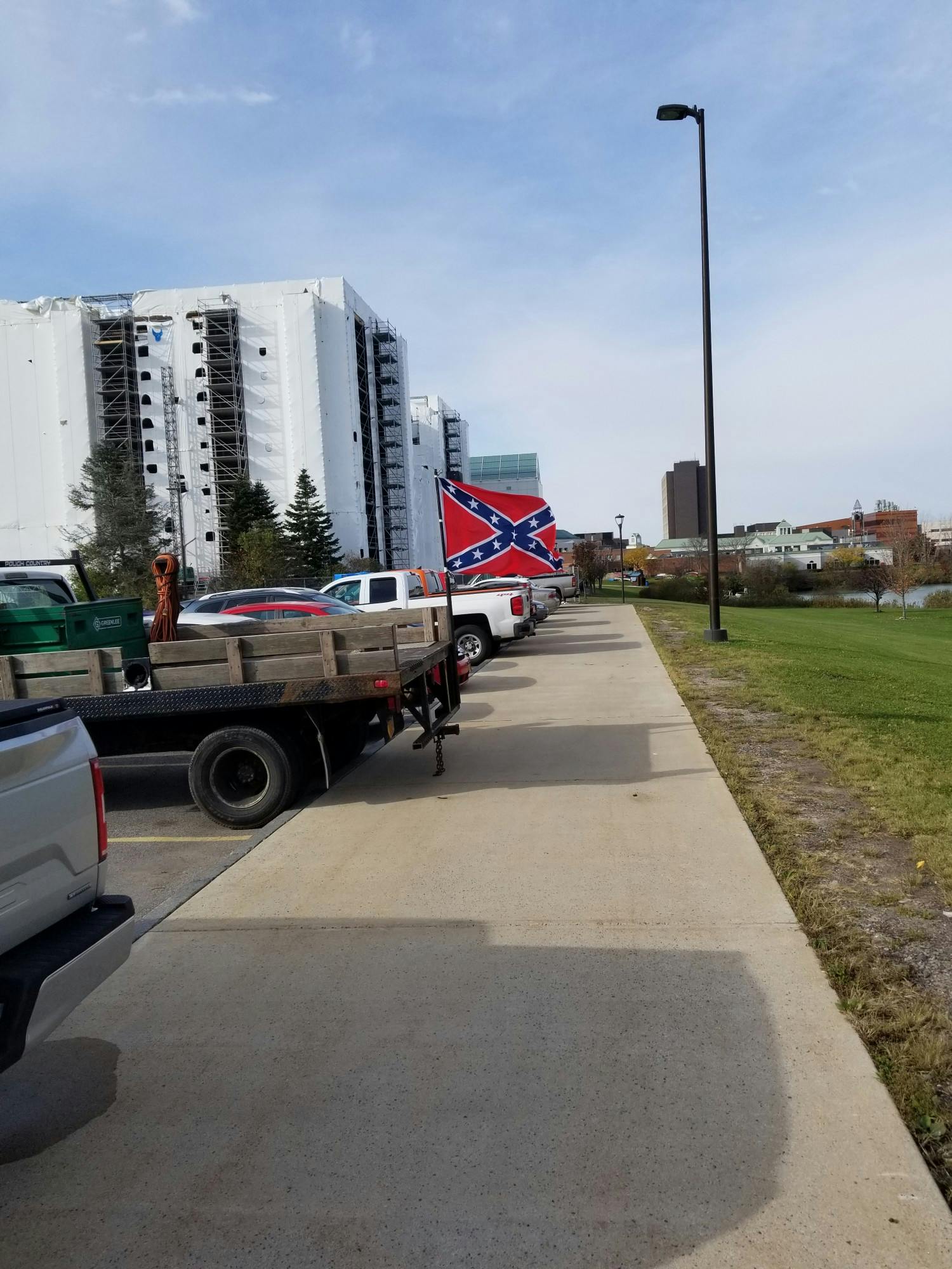The Confederate Flag was displayed on the back of a Dodge truck on Monday. The truck is owned by a worker on the $12 million CFA construction project.
