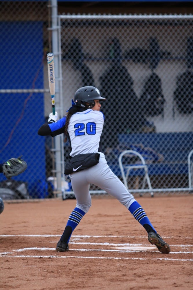 Senior outfielder Leandra Jew waiting for the pitch at home plate. Under first-year head coach Mike Roberts, softball increased offensive stats across the board and nearly doubled its win total.