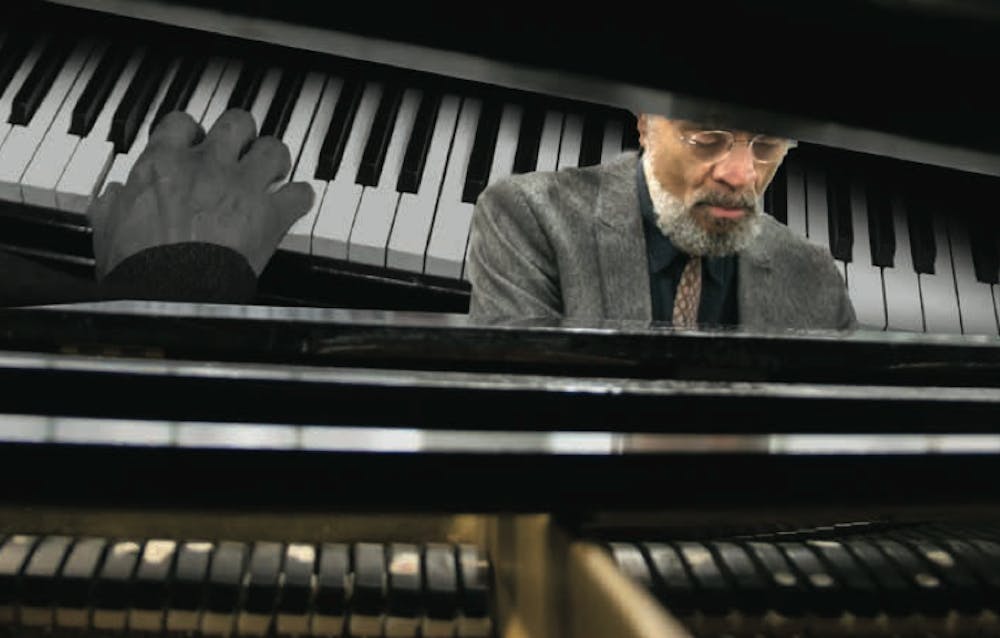 <p>UB instructor&nbsp;George Caldwell sits behind the piano.&nbsp;Grammy Award-winning jazz pianist inspires his students by imparting lessons from his past.&nbsp;</p>