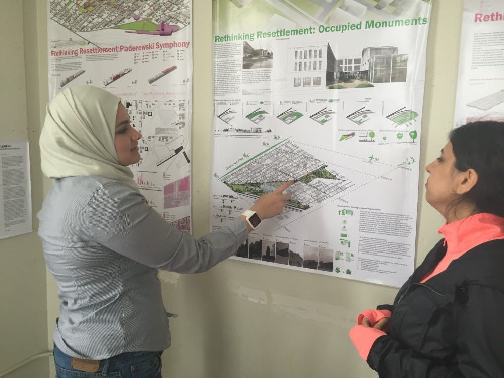 <p>Graduate students Ghalia Ajouz (left) and Leilasadat Mirghaderi (right) are currently designing a temporary housing community for refugees in Buffalo’s East Side.</p>
