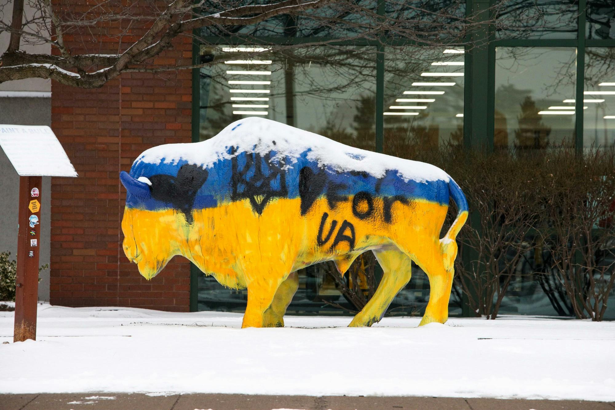 Students painted the bull outside the Student Union blue and yellow, the colors of the Ukrainian flag.&nbsp;