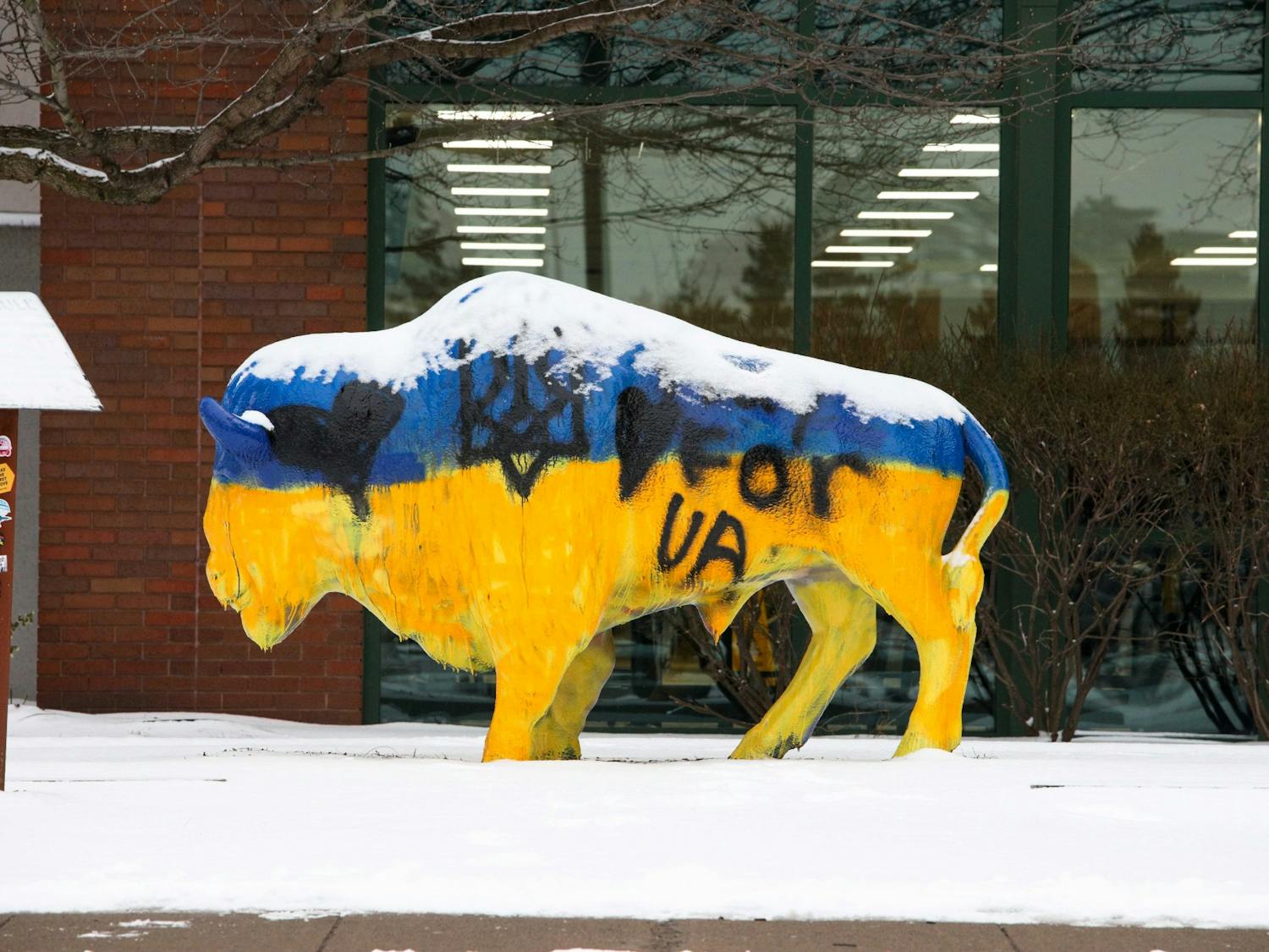 Students painted the bull outside the Student Union blue and yellow, the colors of the Ukrainian flag.&nbsp;