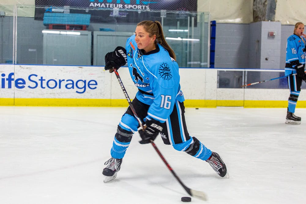 <p>Former UB women's club hockey star and current Buffalo Beauts forward Maddie Norton winds up for a slapshot.</p>