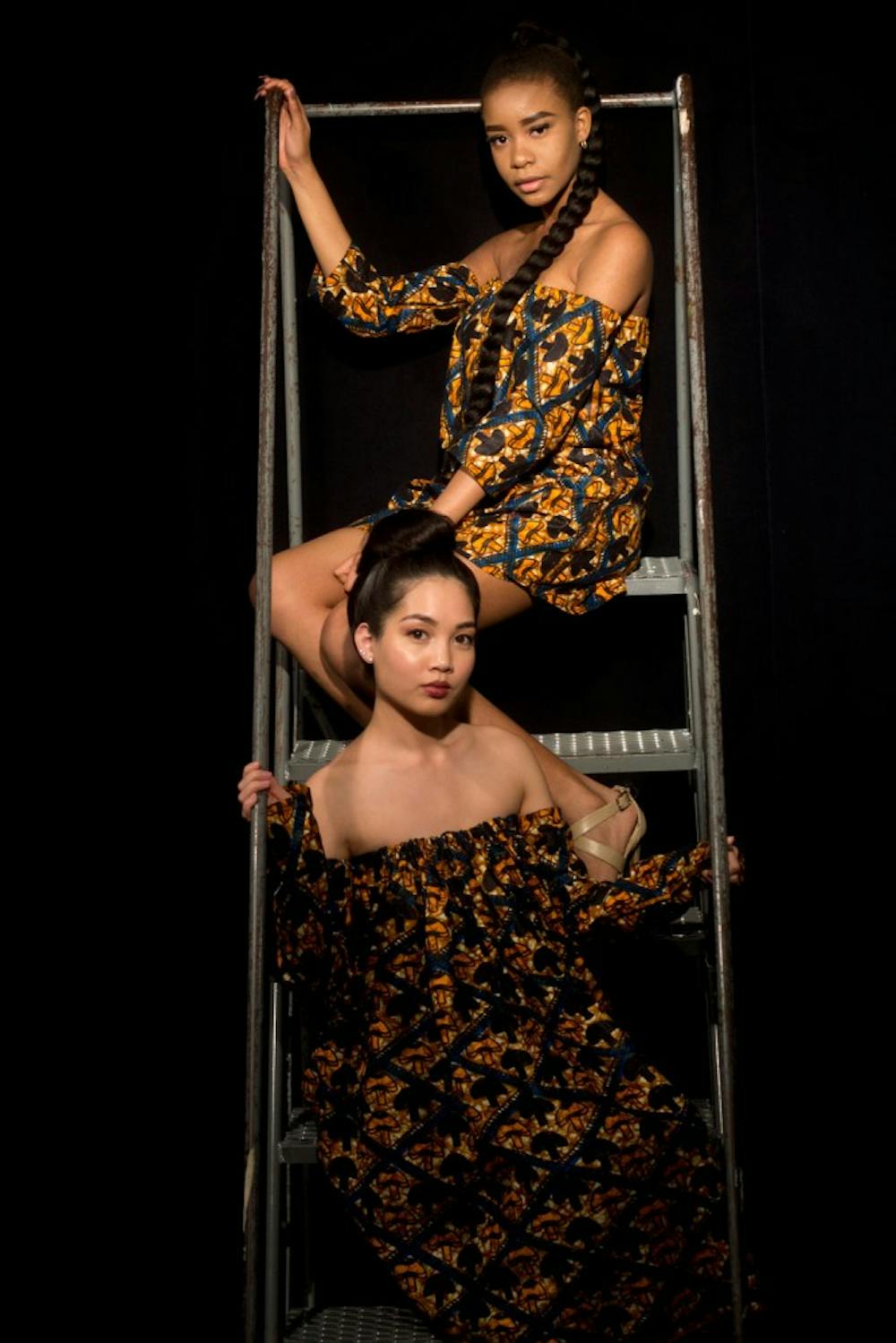 <p>Models wear clothing from KOJ Designs, a line created by Keji Omoboni Jones. The designer was featured in last year's ASA fashion show and won SUNY Oswego's "Battle of the Designers" on April 7.</p>