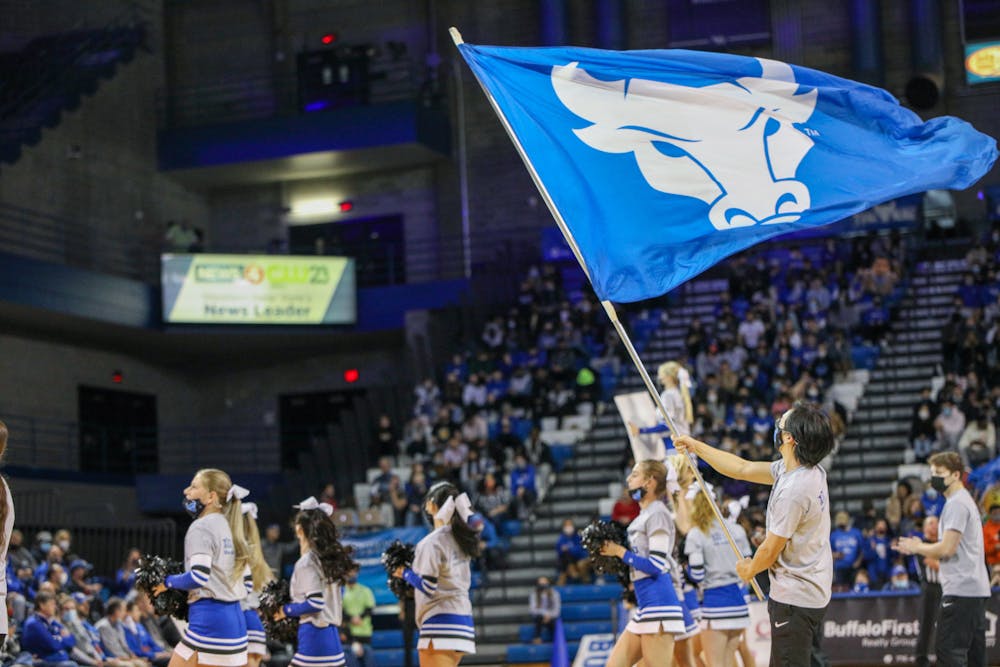 <p>UB fans cheer on the Bulls in Alumni Arena.</p>