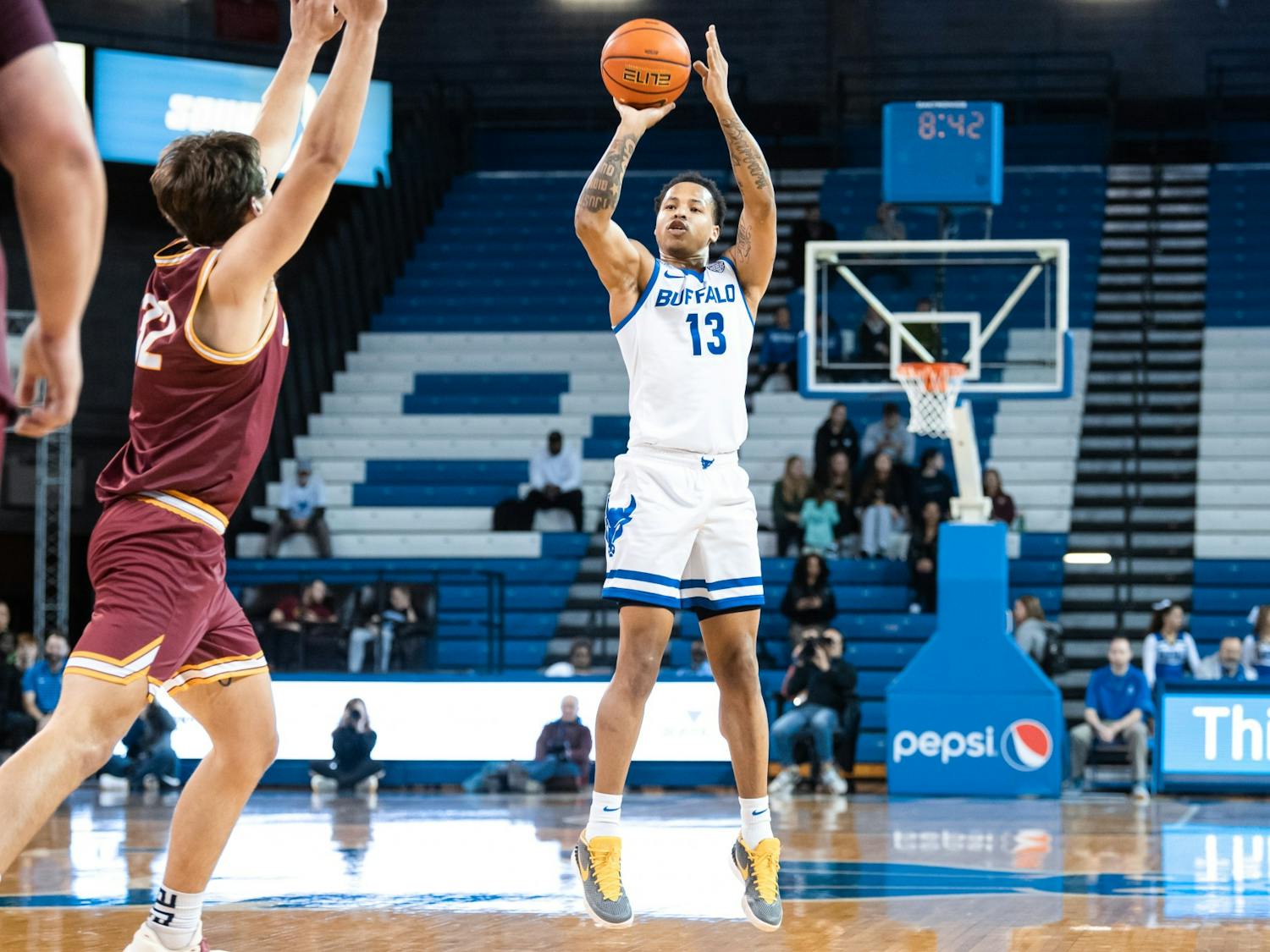 Junior guard Zid Powell takes a shot in UB’s Tuesday matchup against St. John Fisher.