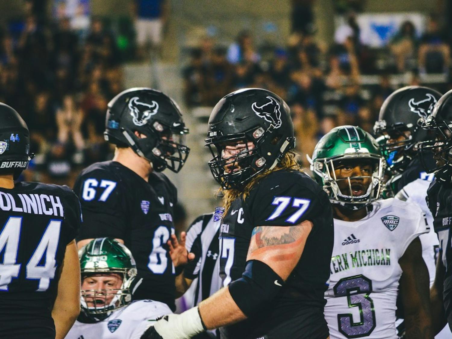 Senior center James O’Hagan stands tall after a play. The Bulls offensive line has yet to allow a sack this season, a key part to Buffalo averaging over 400 yards and 39 points per game on offense.