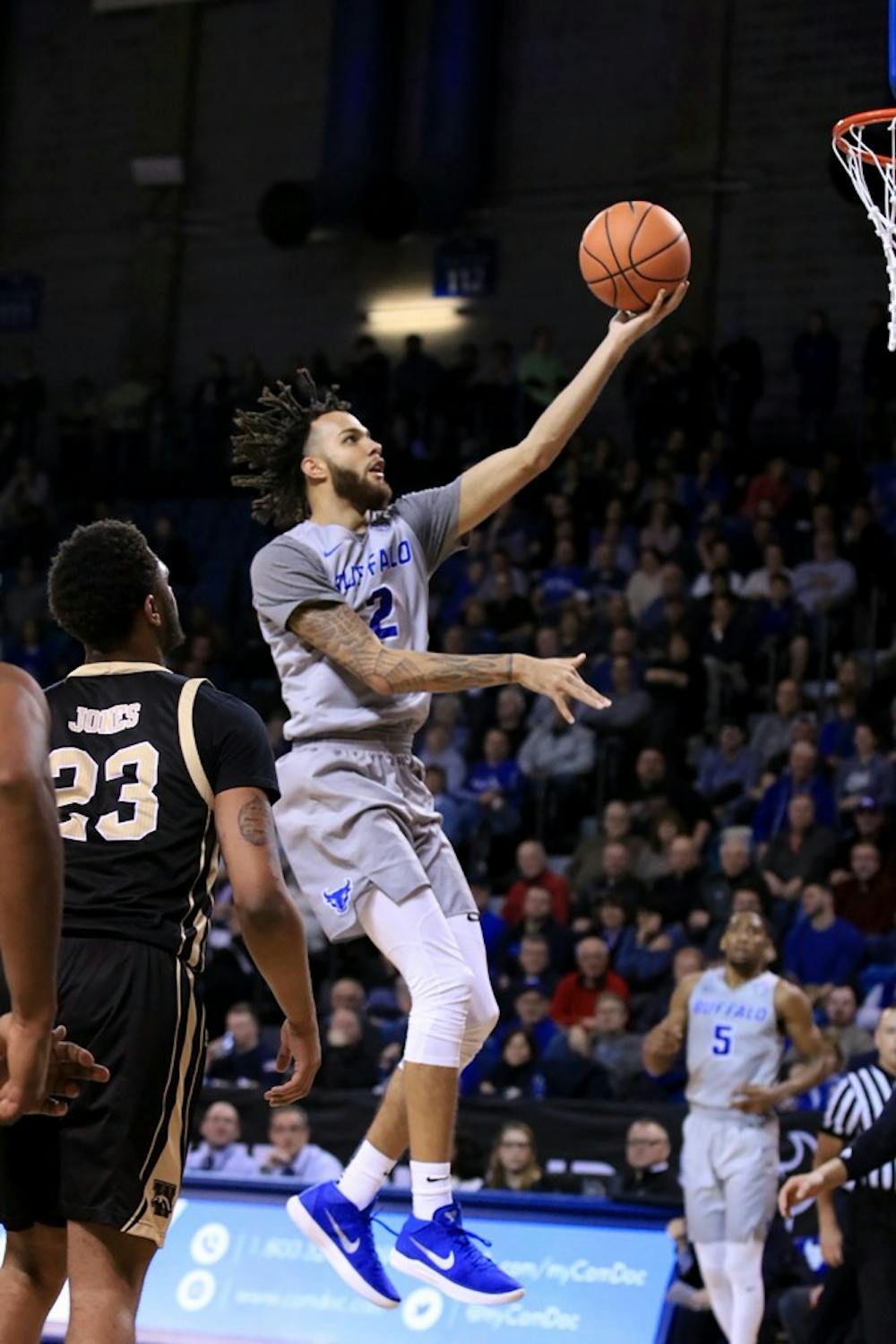 <p>Junior guard Jeremy Harris goes up for a layup. Harris has been a huge addition to the Bulls roster this season and is shooting 41.4 percent from three-point range.</p>