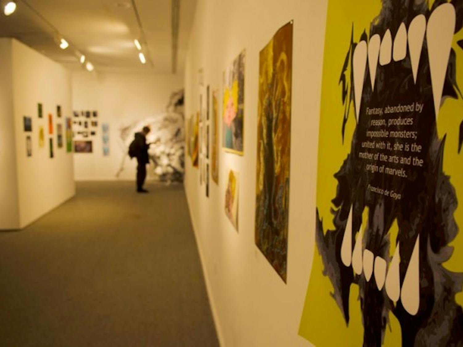 The monsters on display in the Lower Gallery of the Center for the Arts might seem frightening at first, but their visages are meant to provoke thoughts on the human condition. Kainan Guo, The Spectrum