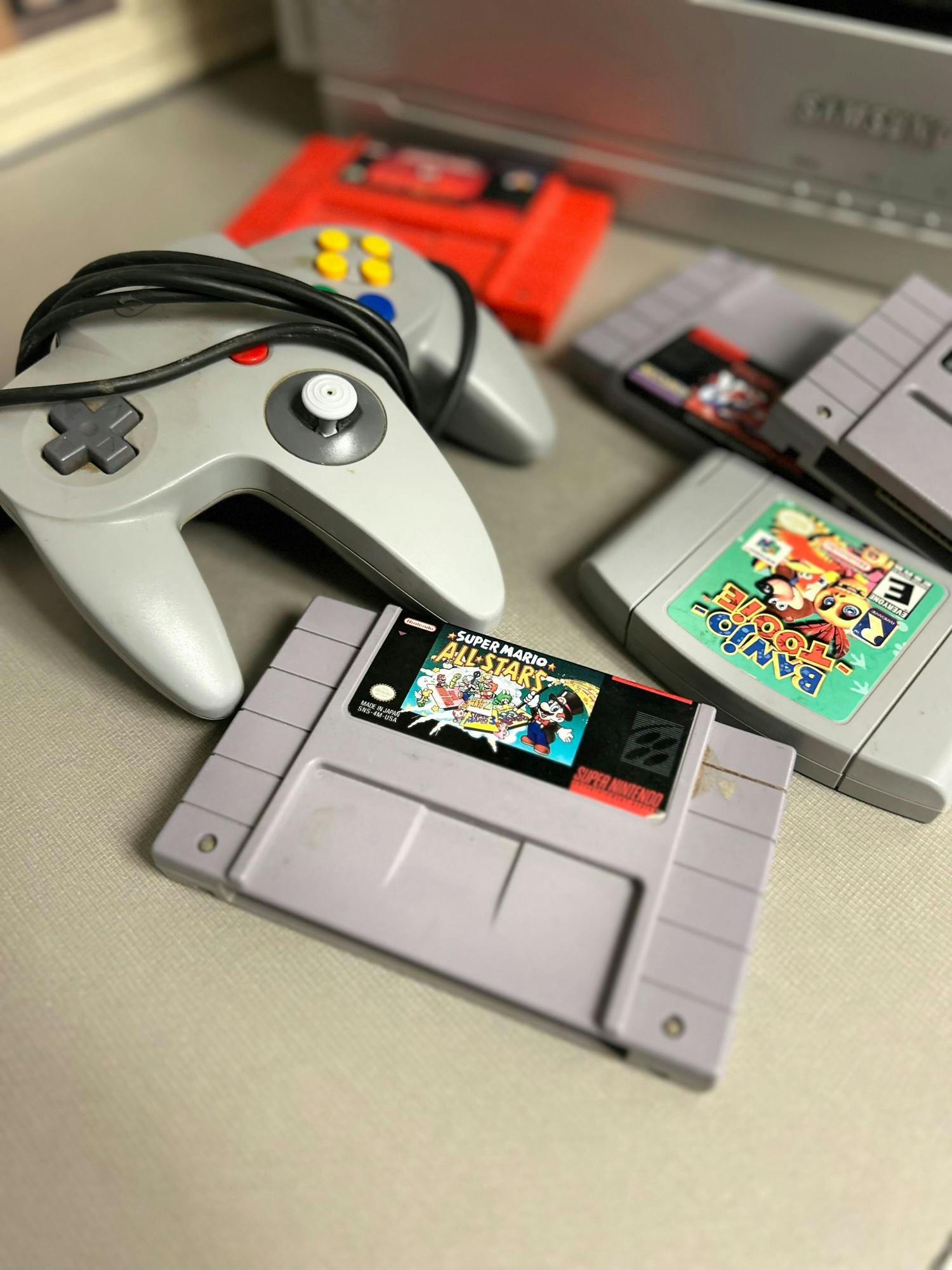 Old video game cartridges and controller 