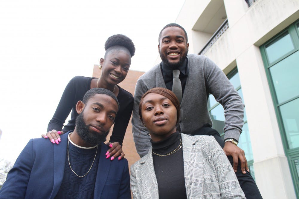 Glenn Brown (BSU Vice President), Awa Magassouba (BSU Treasurer), Florence Ayeni (BSU President) and Varnel Fleurisma (BSU Secretary) pose for a photo outside the Student Union. The four e-board members hope to build off the club’s past and instill BSU’s history in the lives of incoming students during the 2019-20 school year.